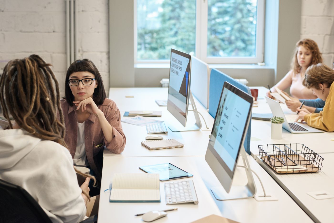 Tech Alphonic specialists collaborating on a client strategy